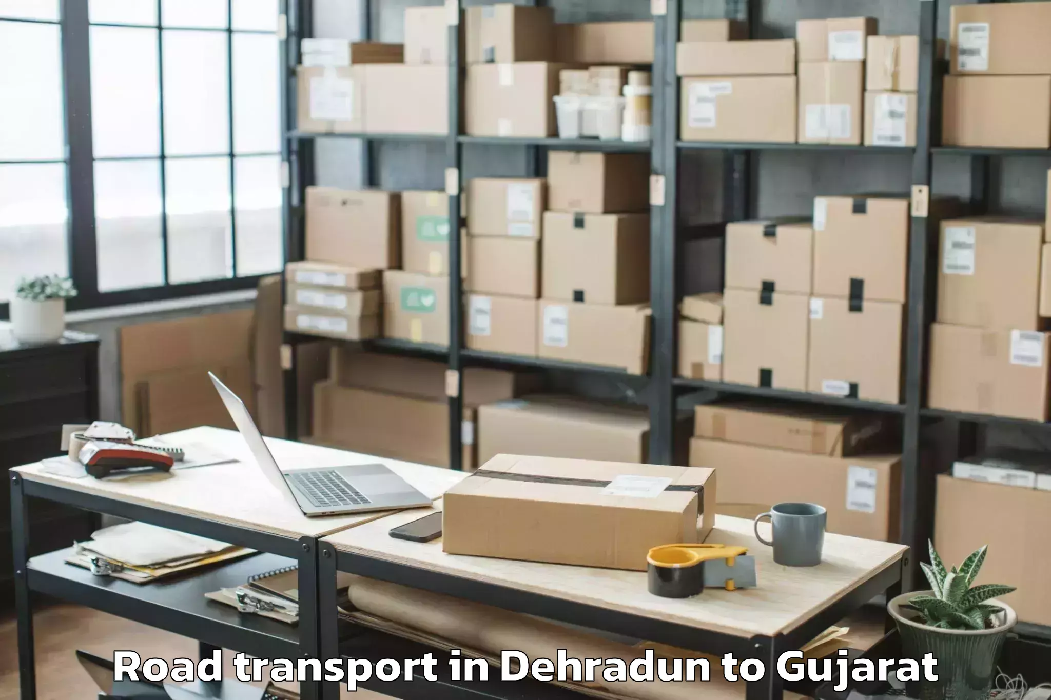 Book Your Dehradun to Petlad Road Transport Today